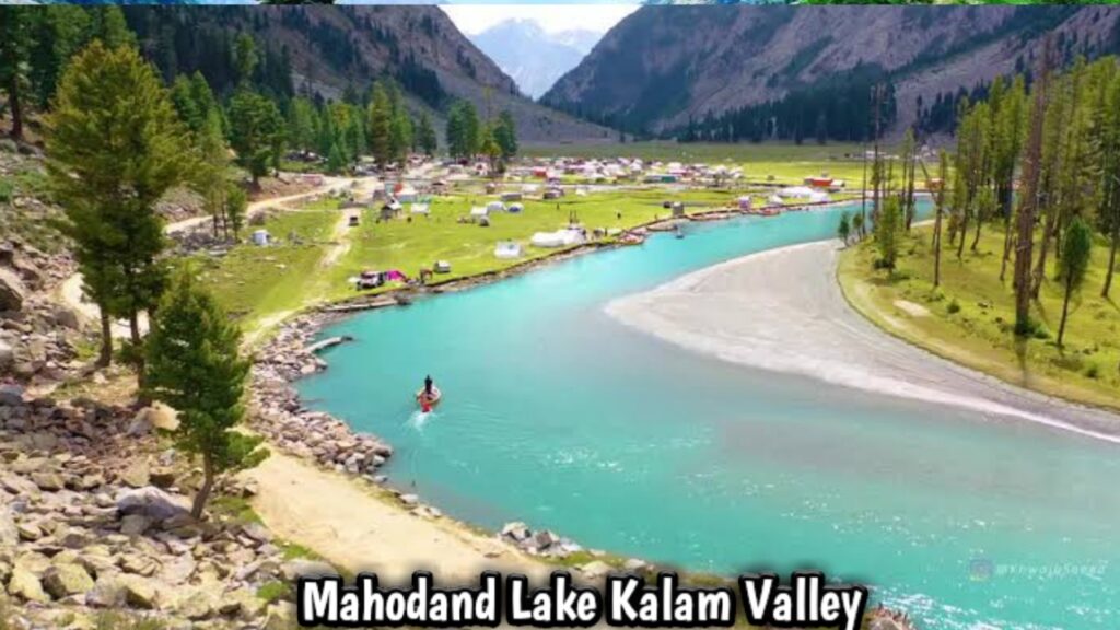 Mahodand Lake in Kalam Valley with clear blue water and snow-capped mountains