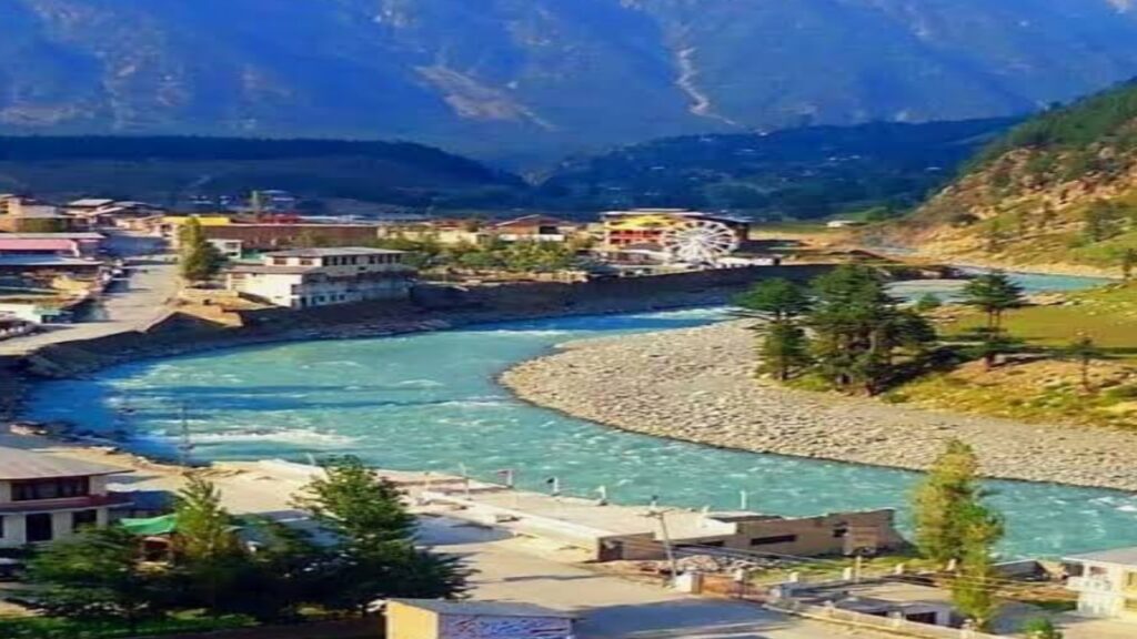 Tourists camping near Swat River in Kalam Valley