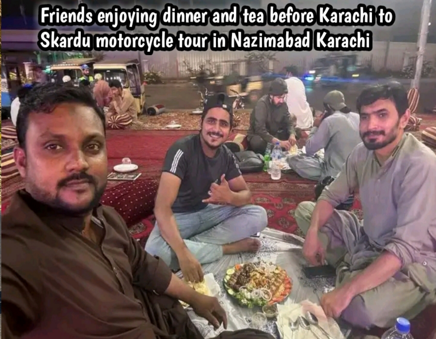 Friends enjoying dinner and tea before Karachi to Skardu motorcycle tour in Nazimabad Karachi