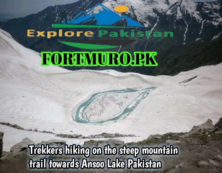 Trekkers hiking on the steep mountain trail towards Ansoo Lake Pakistan